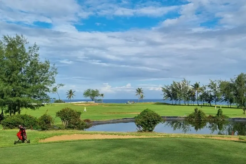 Aerial shot of Golf Course on Kenya's coast, highlighting its ocean views and inclusion in luxury Kenya golf and beach safaris.